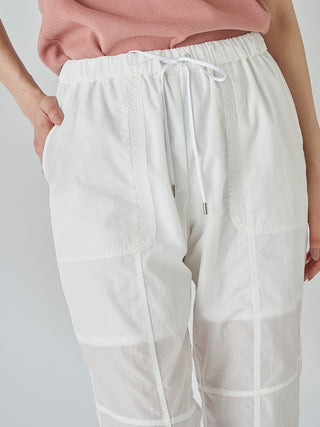  Sustainable Nylon Pants in white, Knit Flared Pants Premium Fashionable Women's Pants at SNIDEL USA
