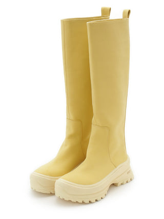 Vibram Matte Long Boots in yellow, Premium Collection of Fashionable & Trendy Women's Shoes, Boots, Loafers, & Sandals at SNIDEL USA
