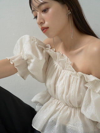 Jacquard Volume Gathered Off-Shoulder Ruffle Blouse in IVORY, Premium Fashionable Women's Tops Collection at SNIDEL USA.