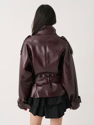 Back view of the brown SNIDEL Stand Collar Belted Jacket showing waist belt and center seam.