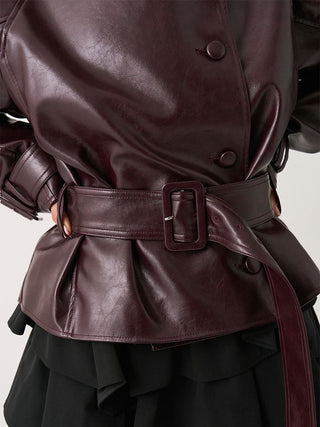 Close-up of the brown SNIDEL Stand Collar Belted Jacket's waist belt, rectangular buckle and front buttons.