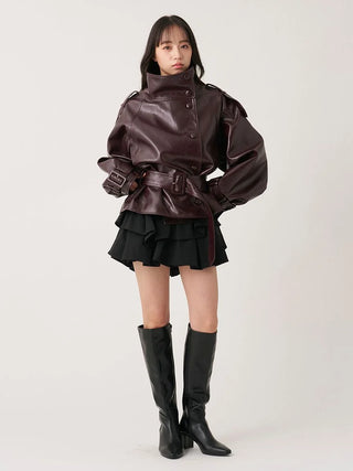 Brown SNIDEL Stand Collar Belted Jacket worn belted with a black mini skirt and knee-high boots.
