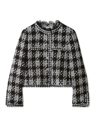 A cropped tweed jacket with a black and white houndstooth pattern, featuring a round neckline with faux fur trim and long sleeves, shown against a plain white background.