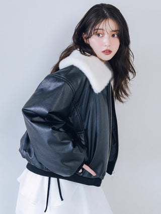 Side-angle view of the black SNIDEL Faux Fur Blouson, showing its white collar and voluminous sleeves.