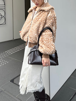 Angled view of the brown spotted SNIDEL Faux Fur Blouson, showing its large collar and balloon sleeve.
