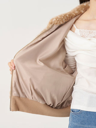 SNIDEL Faux Fur Blouson held open to show its beige lining, interior seams and ribbed waistband.