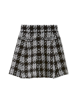 A black and white tweed plaid pleated skirt with a textured woven pattern, shown flat against a plain white background.