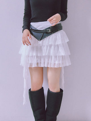 White SNIDEL Twist Frill Mini Skort styled with a black turtleneck, wide belt and knee-high boots.