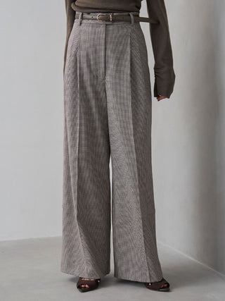 Front view of the checked SNIDEL Belted Tuck Pants, showing the slim belt, double pleats and wide legs.