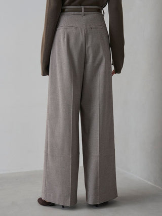 Back view of the checked SNIDEL Belted Tuck Pants, showing welt pockets, belt loops and pressed leg creases.