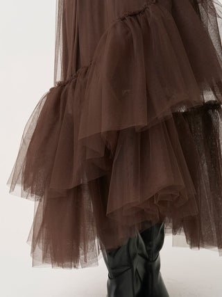 Close-up of the brown SNIDEL Asymmetrical Tulle Volume Skirt's overlapping sheer ruffles and uneven hem.
