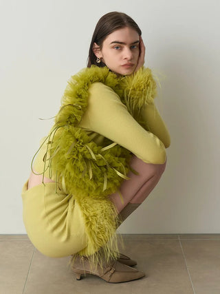 Side View Girl in Tulle Ribbon Bag sitting