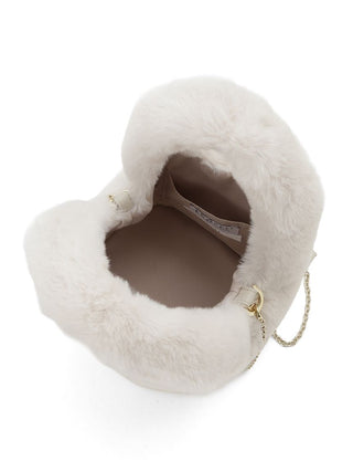 A fluffy faux fur handbag in off-white, shown from an overhead angle with its gold-tone chain strap visible on a white background.