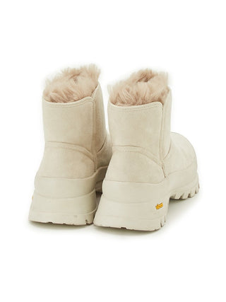 Vibram Collaboration Faux Mouton Boots in ivory, Premium Collection of Fashionable & Trendy Women's Boots, Pumps, Loafers & Flats,  & Sandals at SNIDEL USA