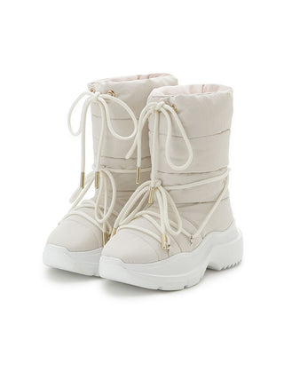A pair of off-white quilted lace-up winter boots with chunky white platform soles and small gold-tone hardware, shown on a clean white background.