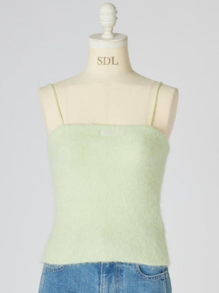 A pale mint green fuzzy knit camisole top displayed on a cream mannequin torso, paired with blue jeans against a light gray studio background.